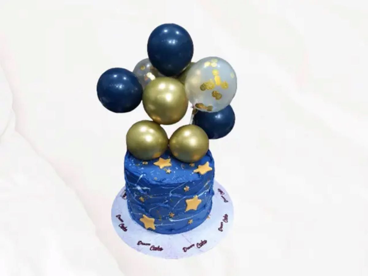 star cake with balloons