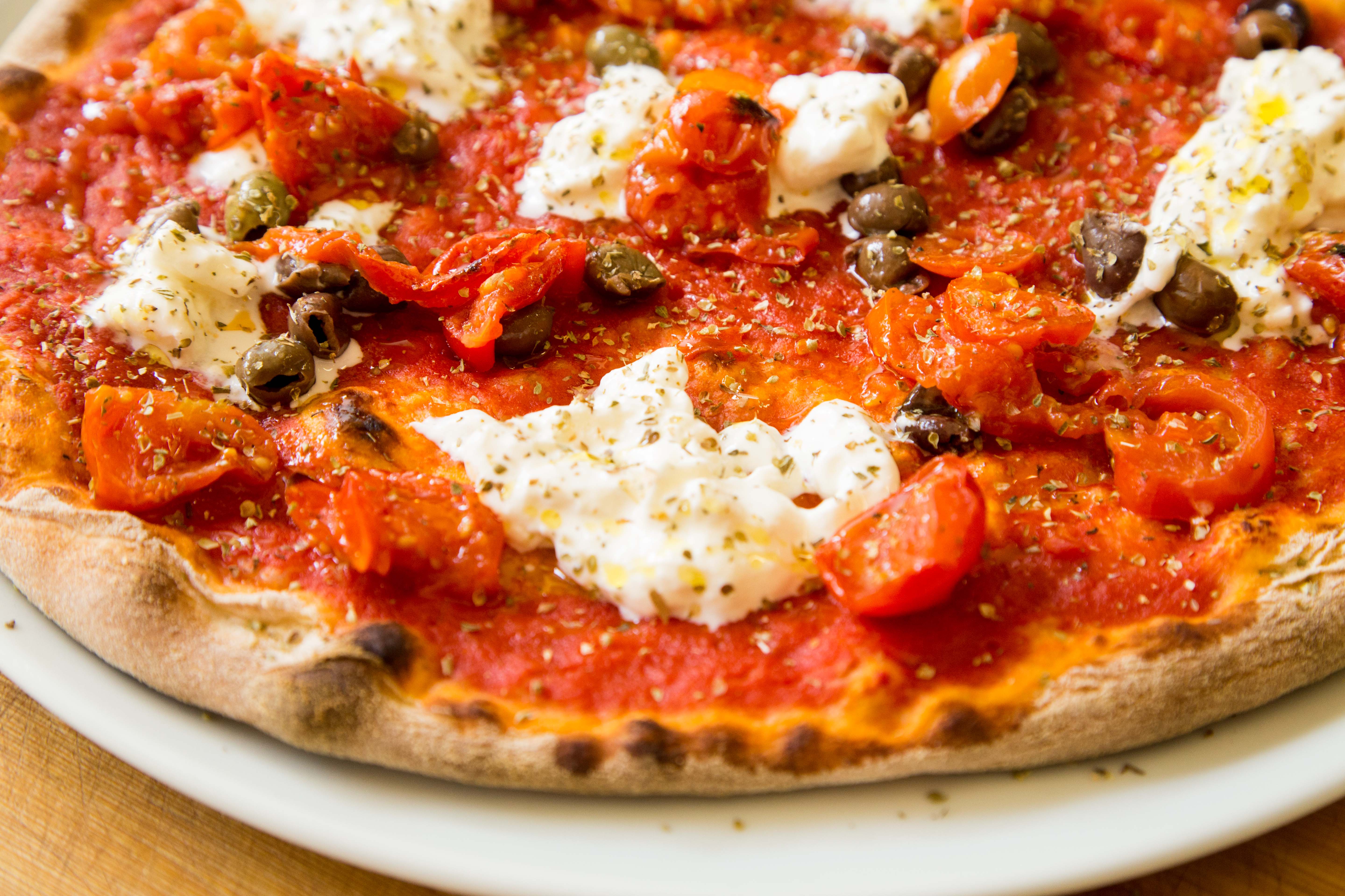 Pizza Queen delivery from Mostacciano Order with Deliveroo