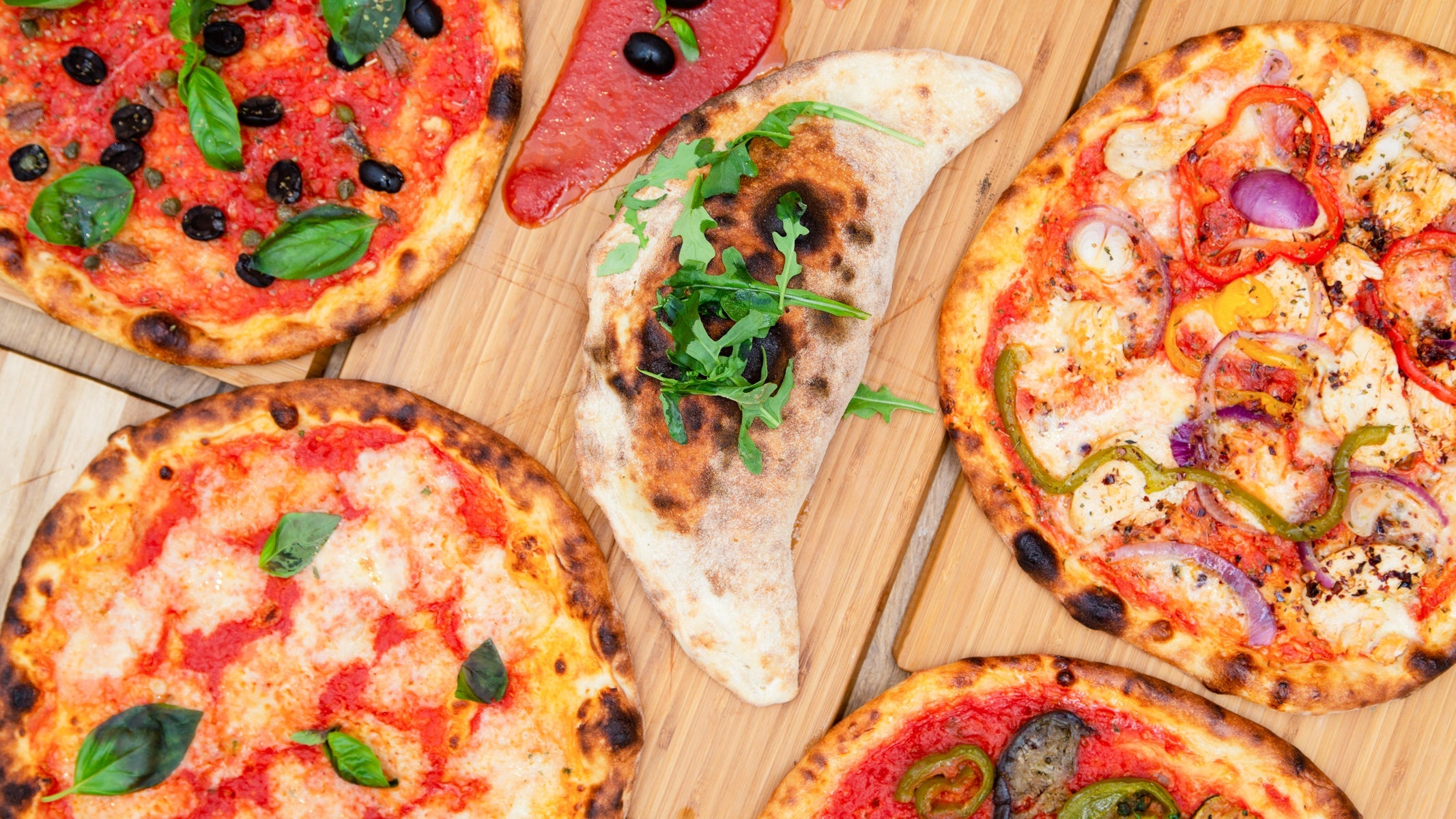 Roman Pizza Project delivery from Dean Village Order with Deliveroo