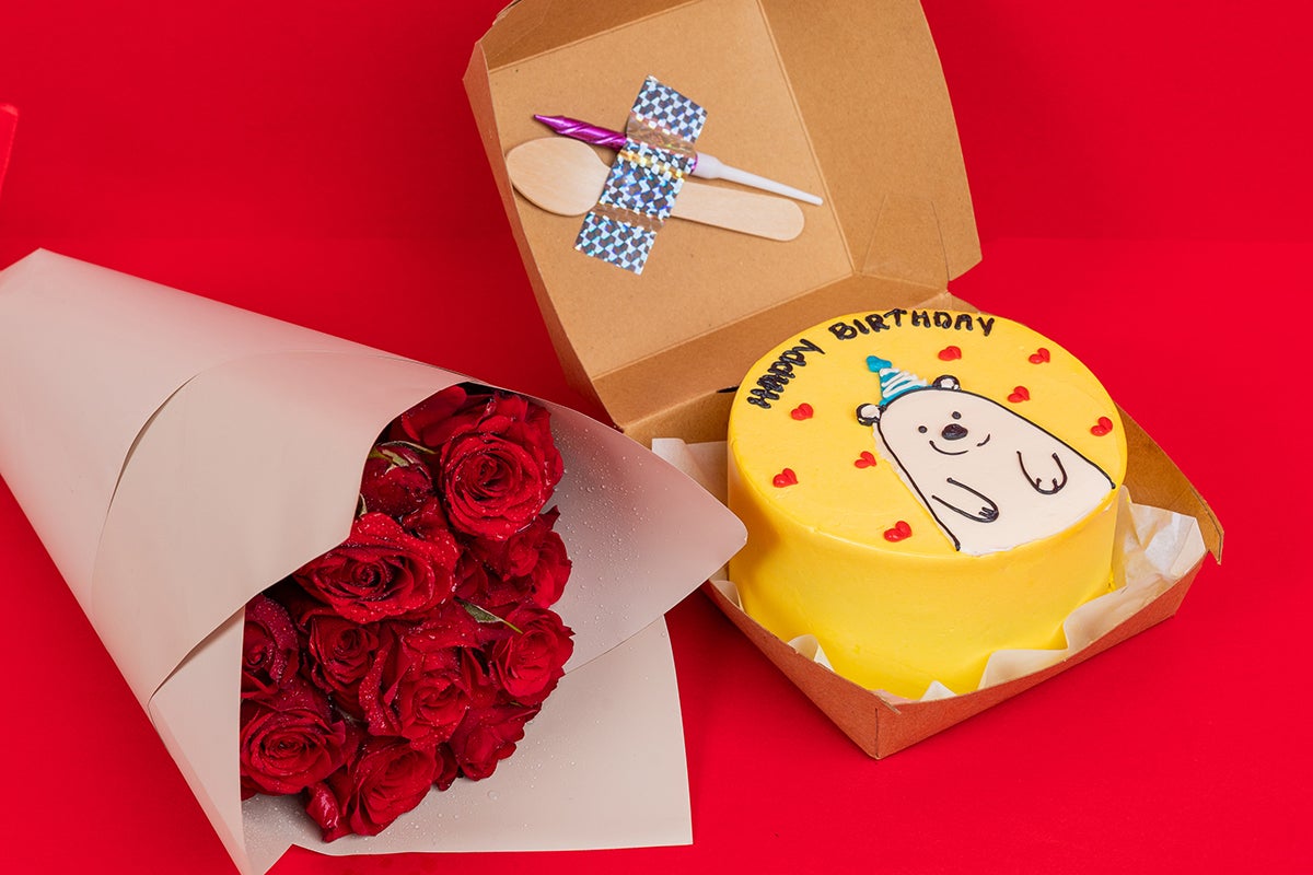 White teddy cake With flowers