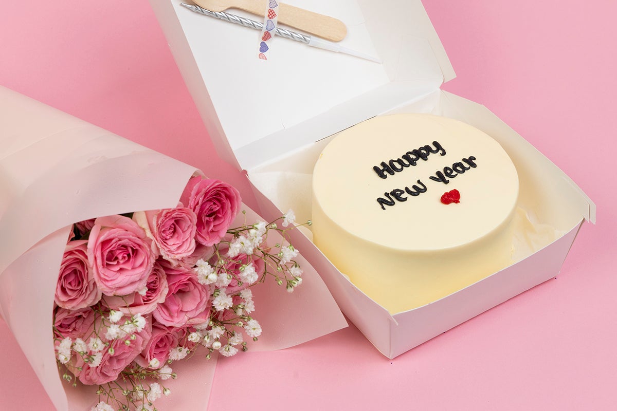Black Write Happy New Year Cake with Flowers