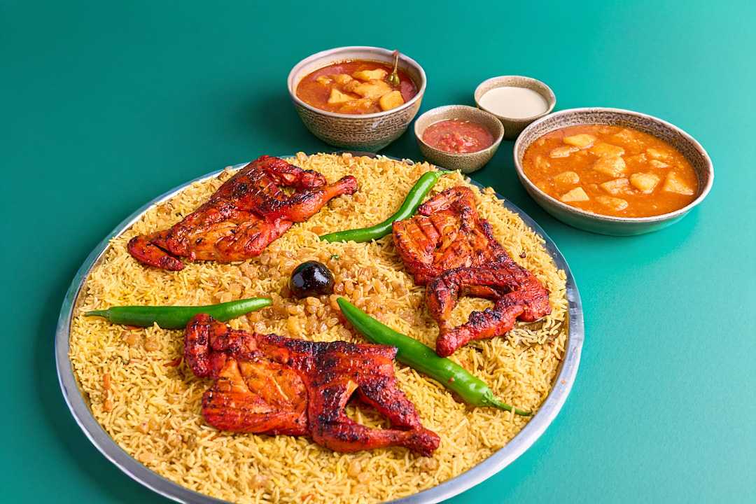Charcoal Grilled Chicken Bukhari with rice