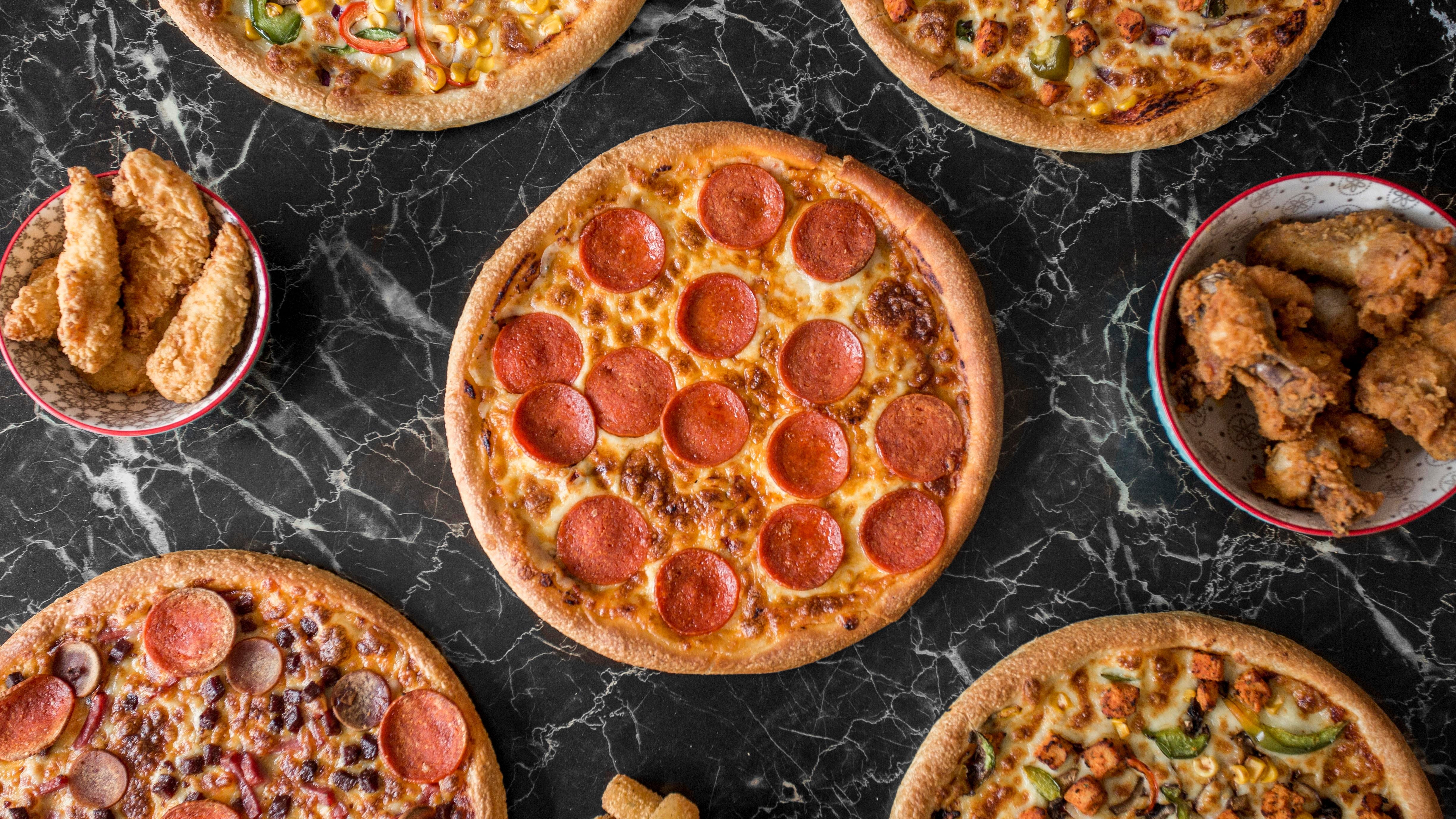 Pizza Guys delivery from Battersea Order with Deliveroo