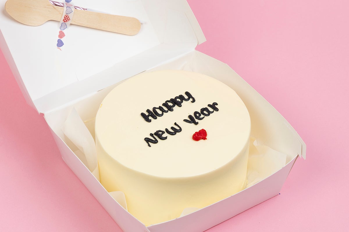 Black Write Happy New Year Cake