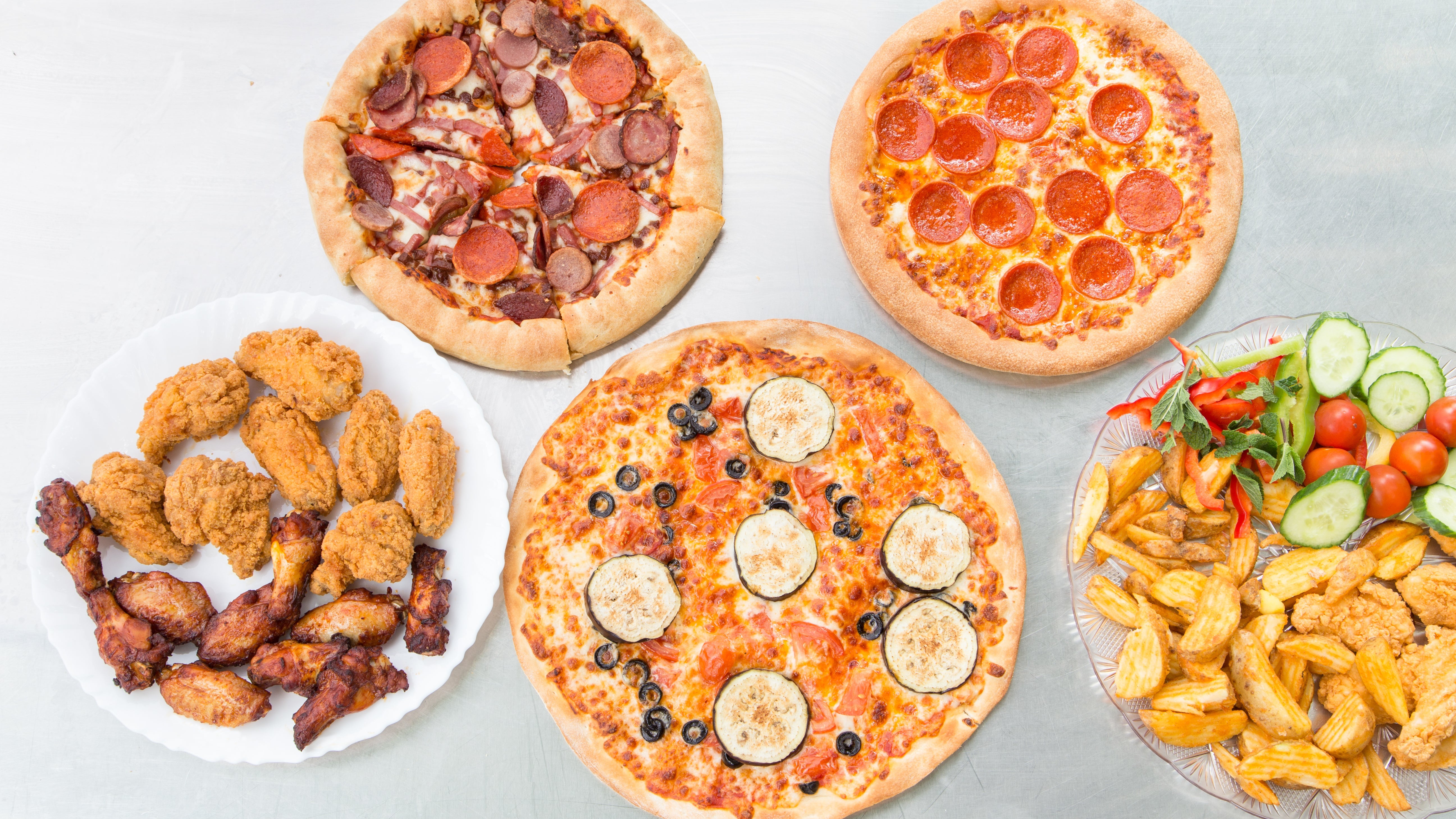 Pizza Mania delivery from Peckham Order with Deliveroo