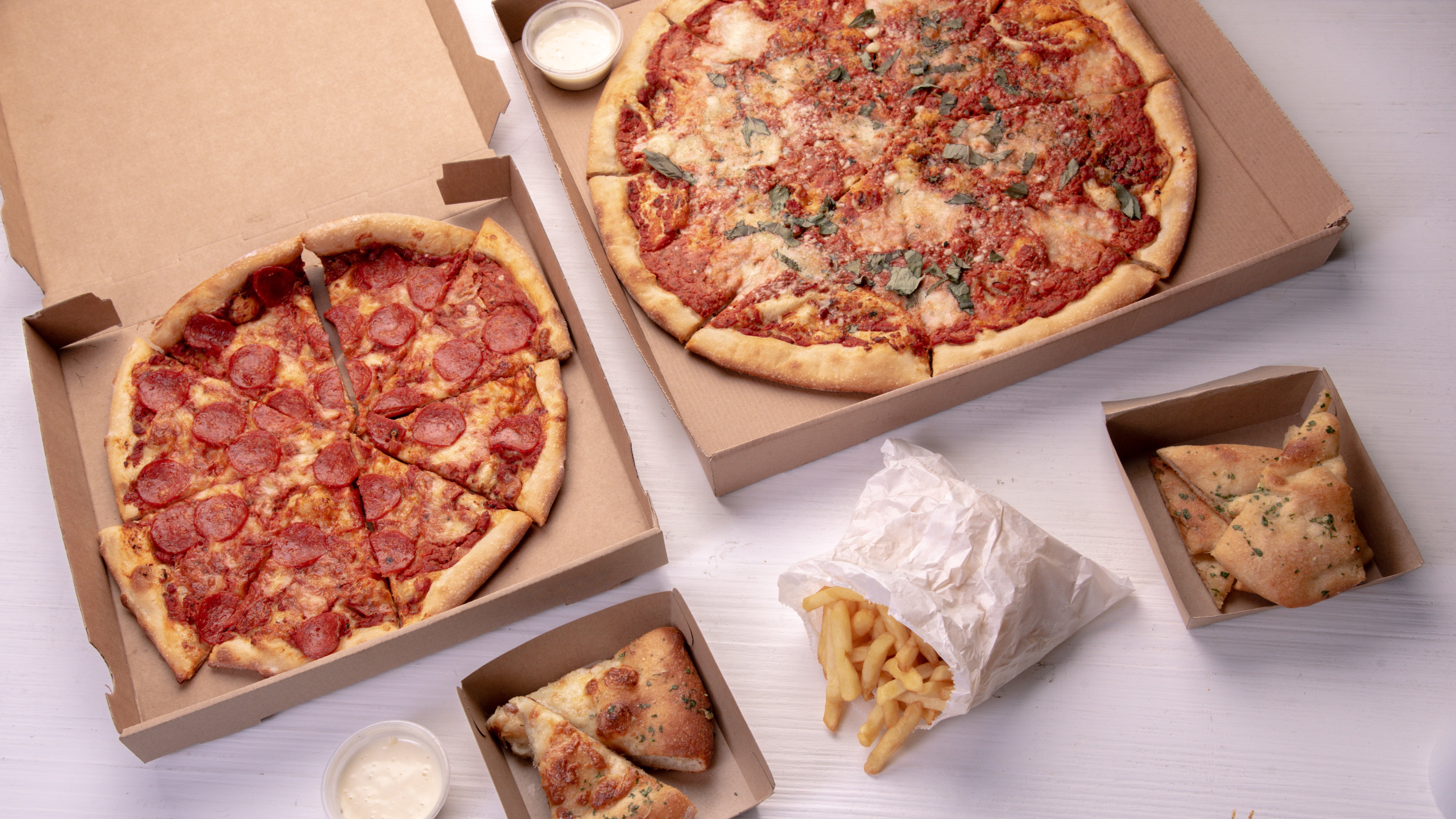 Carinos Pizza and Peri Peri delivery from Kings Heath Order with