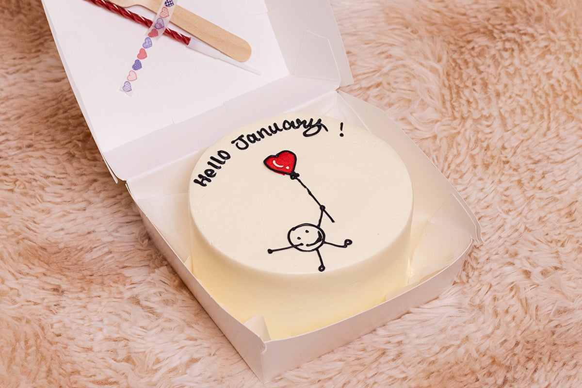 Hello January Holding Heart Cake