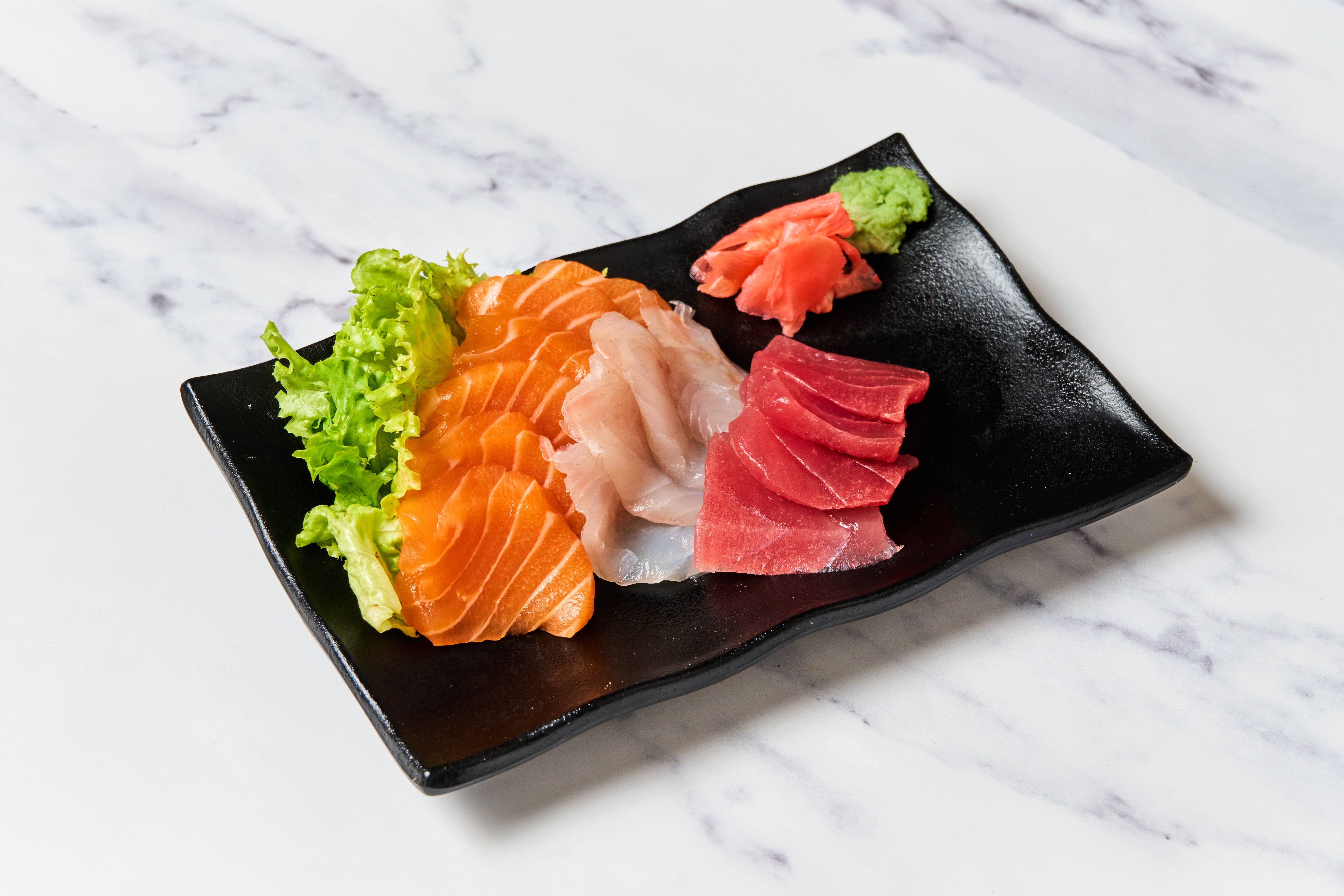Sashimi mixte - 14 pièces + (riz)