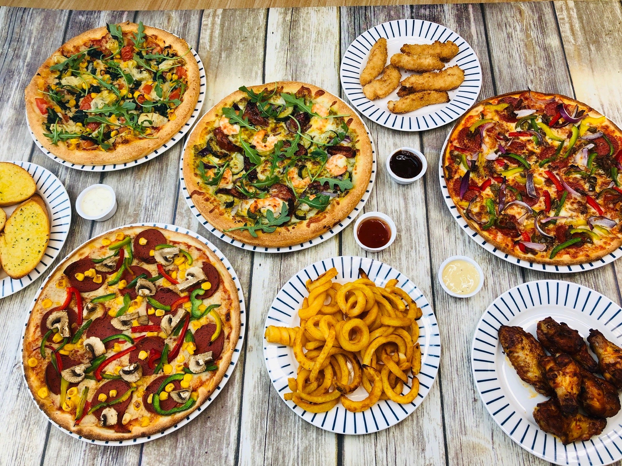 Village Pizza Epsom delivery from Ewell Order with Deliveroo